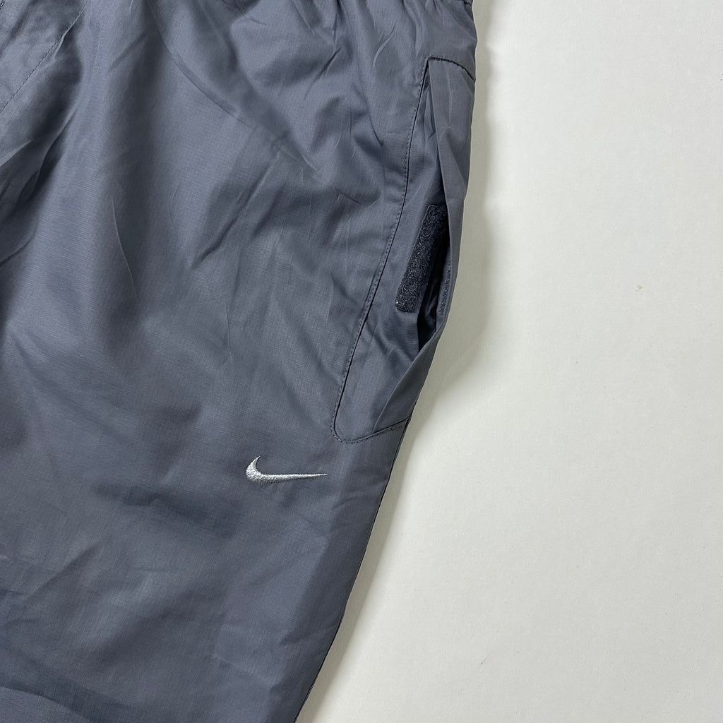 Vintage Y2K Nike Track Pants in Gray (Size 26-34)