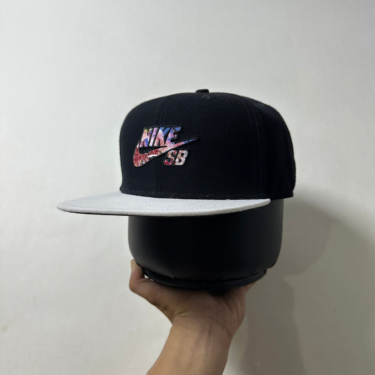 Nike SB Snapback Cap in Black & White with Floral Logo (One Size)