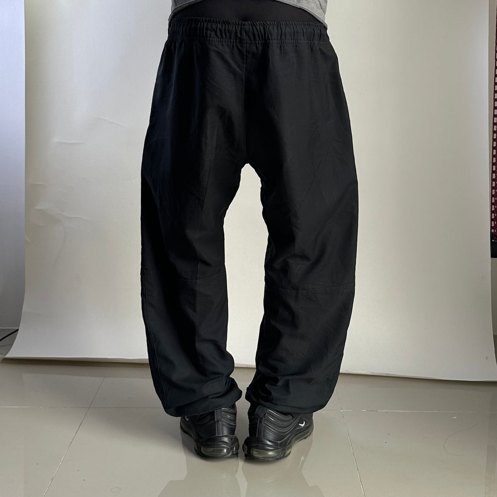 NIKE Dry-Fit Woven Team Training Pants in Black (Size 36-40)