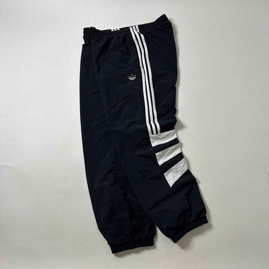 ADIDAS Originals Track Pants in Black featuring Trefoil Logo on the leg (Size 32-38)