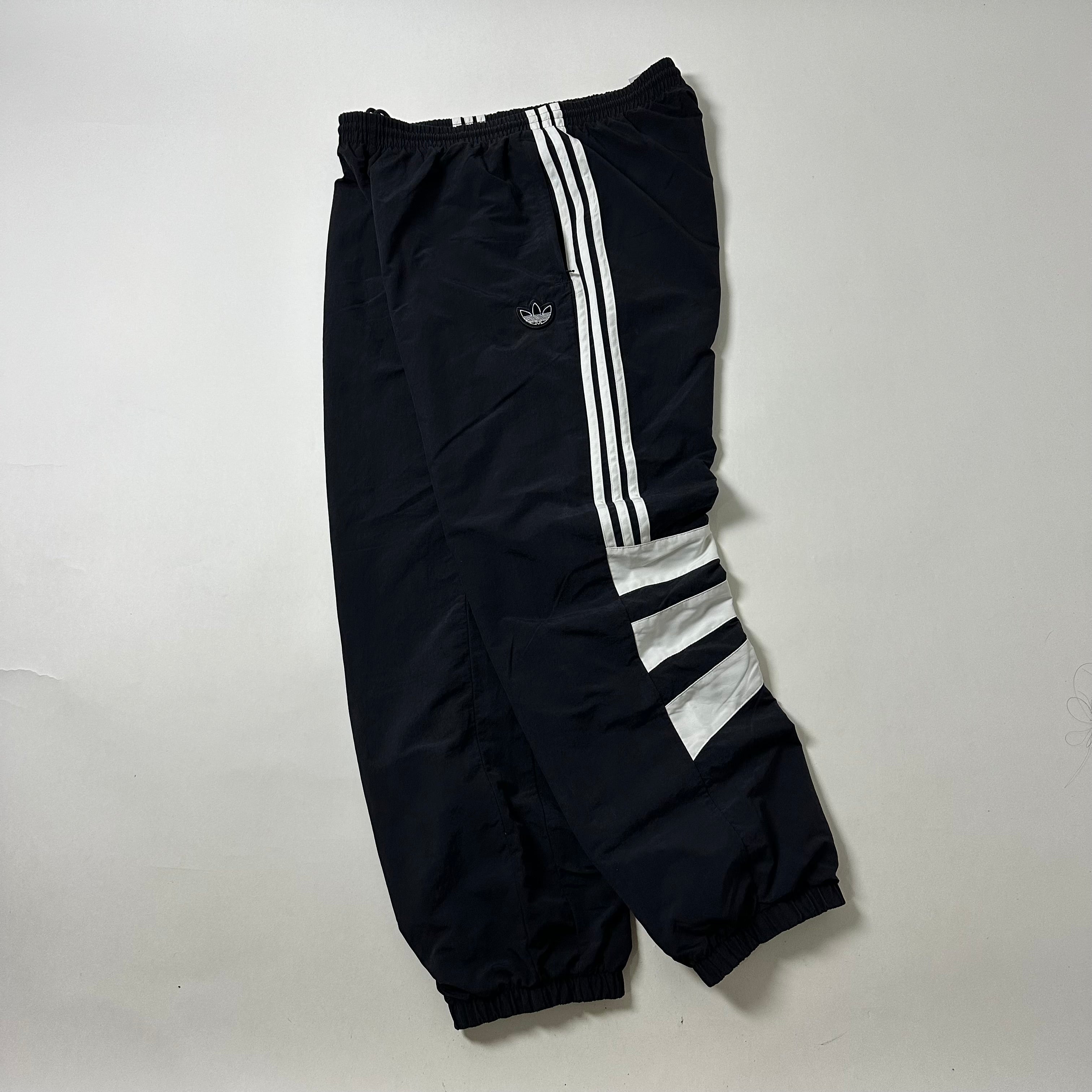 ADIDAS Originals Track Pants in Black featuring Trefoil Logo on the leg (Size 32-38)