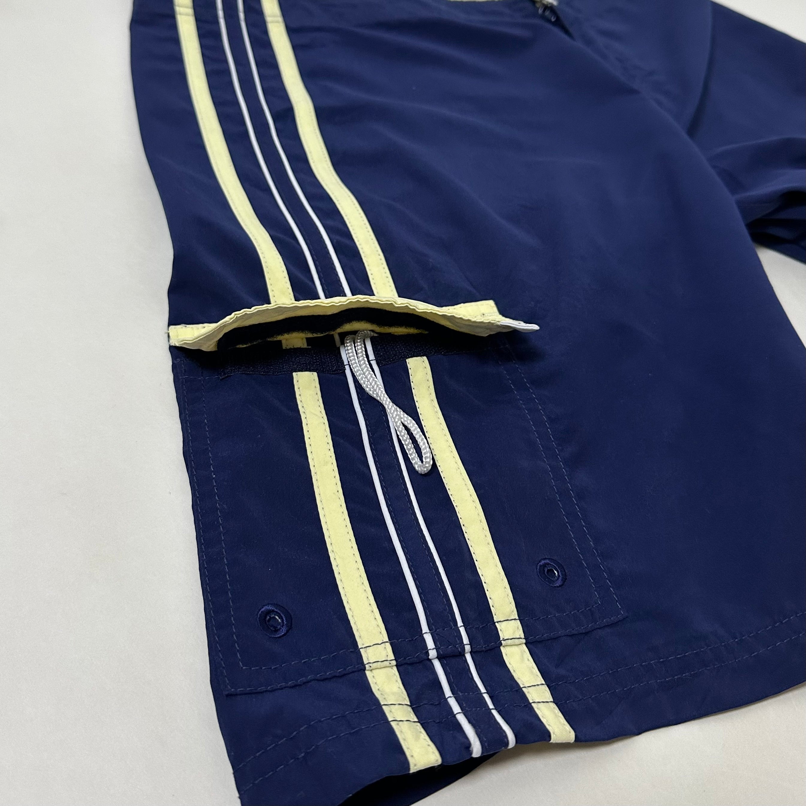 2000’s Billabong Board Shorts in Navy Blue and Yellow Color way Size 32