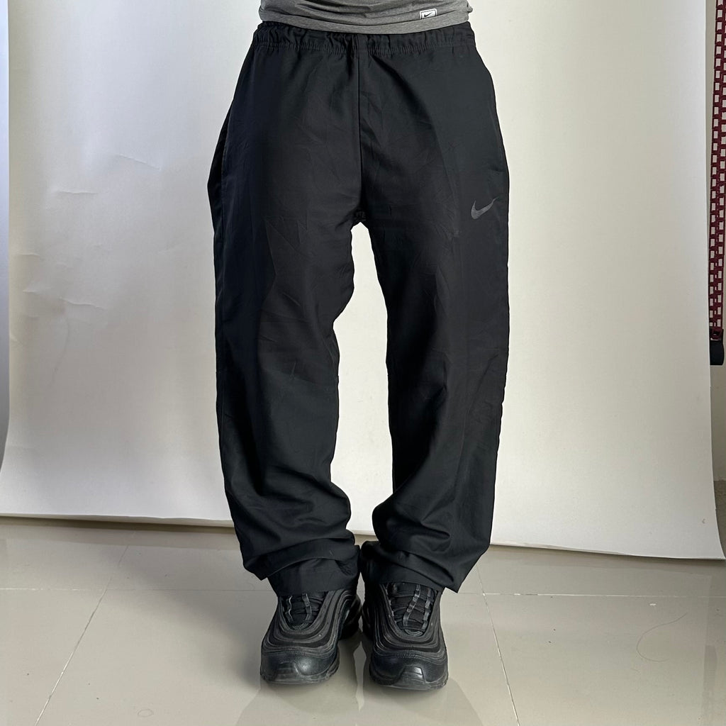 NIKE Dry-Fit Woven Team Training Pants in Black (Size 36-40)