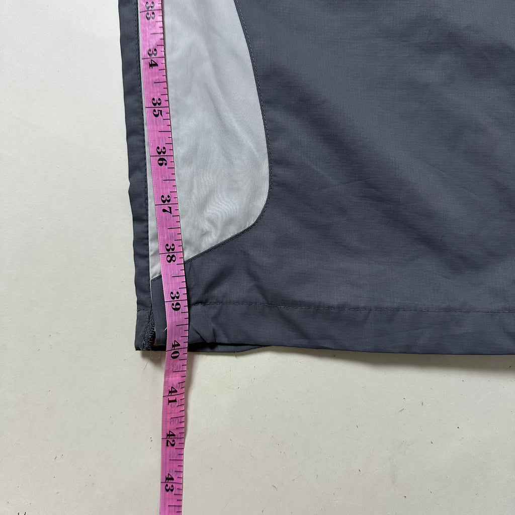Vintage Y2K Nike Track Pants in Gray (Size 26-34)