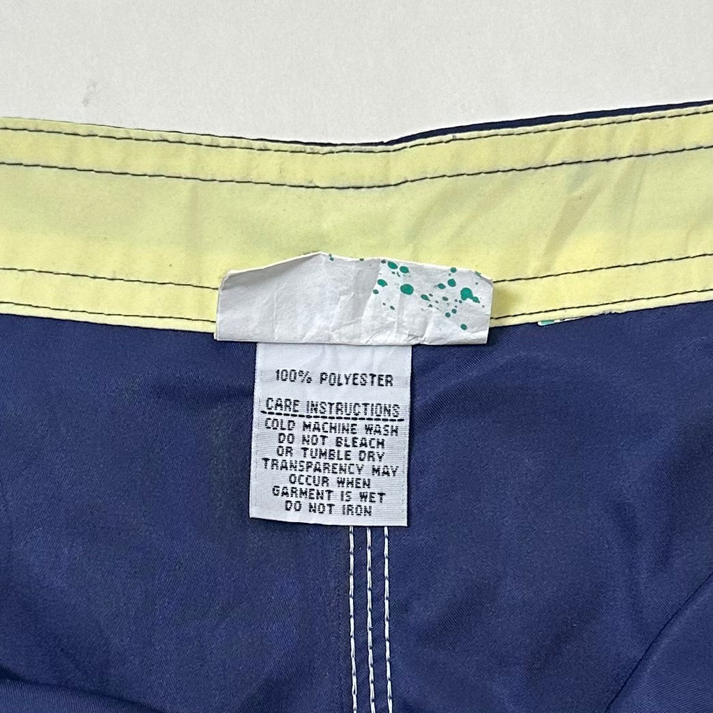 2000’s Billabong Board Shorts in Navy Blue and Yellow Color way Size 32