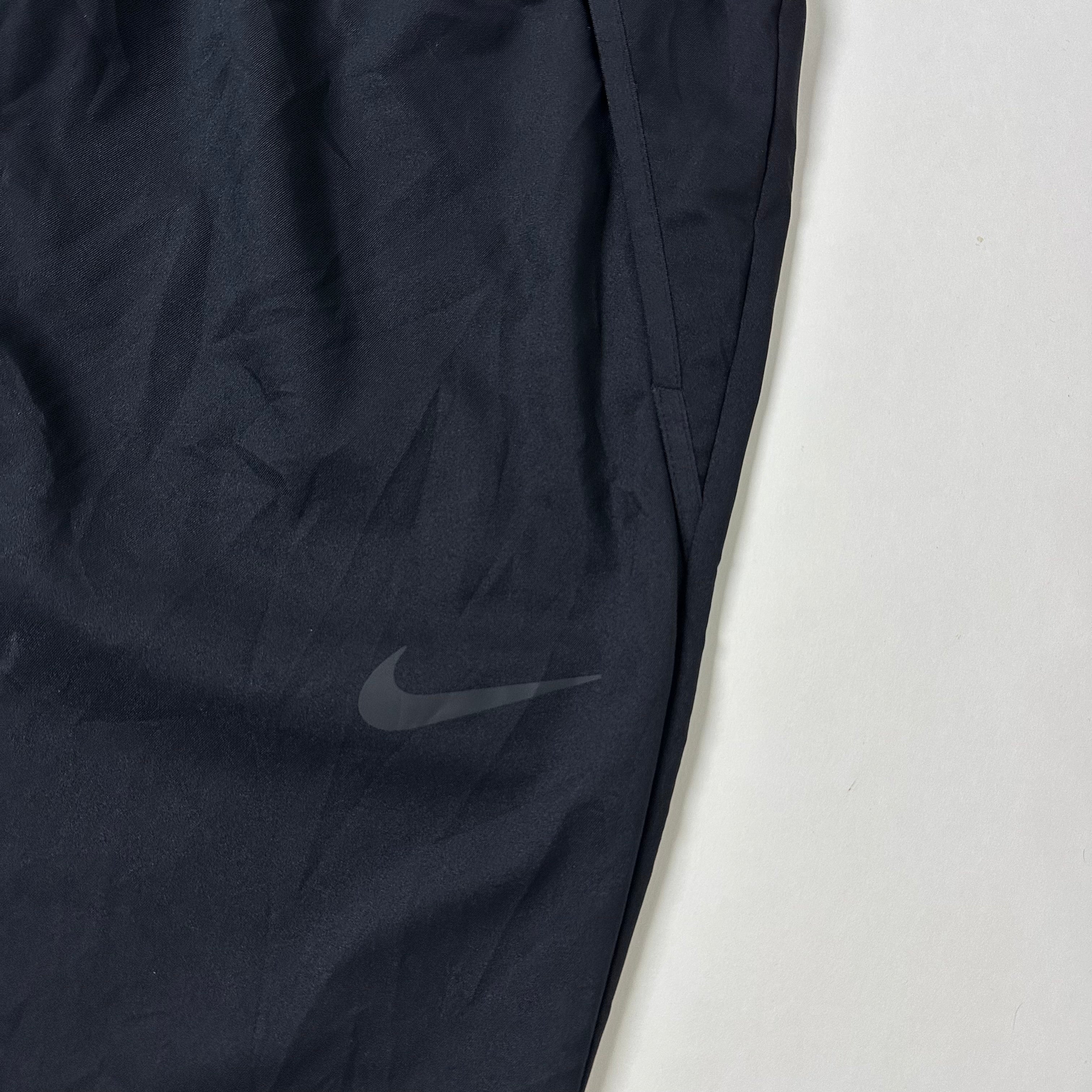 NIKE Dri-Fit Team Woven Training Pants in Black (Size 32-38)
