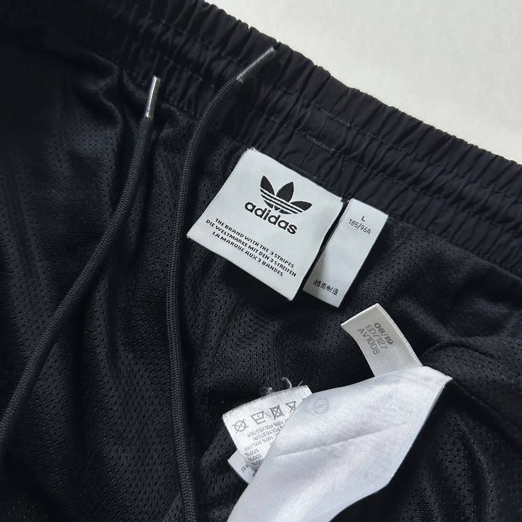 ADIDAS Originals Track Pants in Black featuring Trefoil Logo on the leg (Size 32-38)