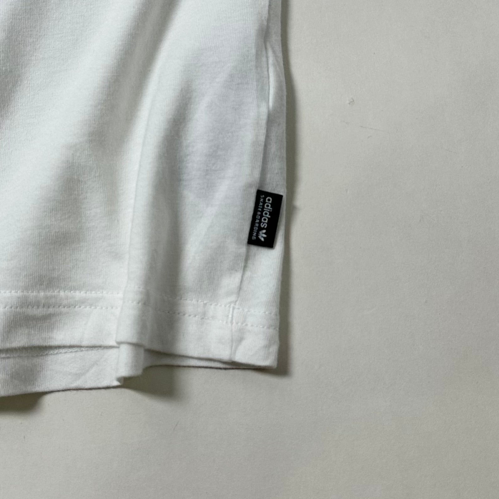 Adidas Grand T-Shirt, specifically the "White Red Blue" Small
