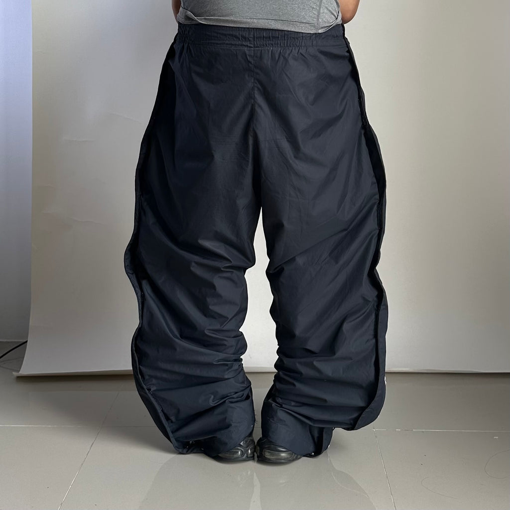 Vintage Y2K Nike Track Pants in Black (Size 32-38)