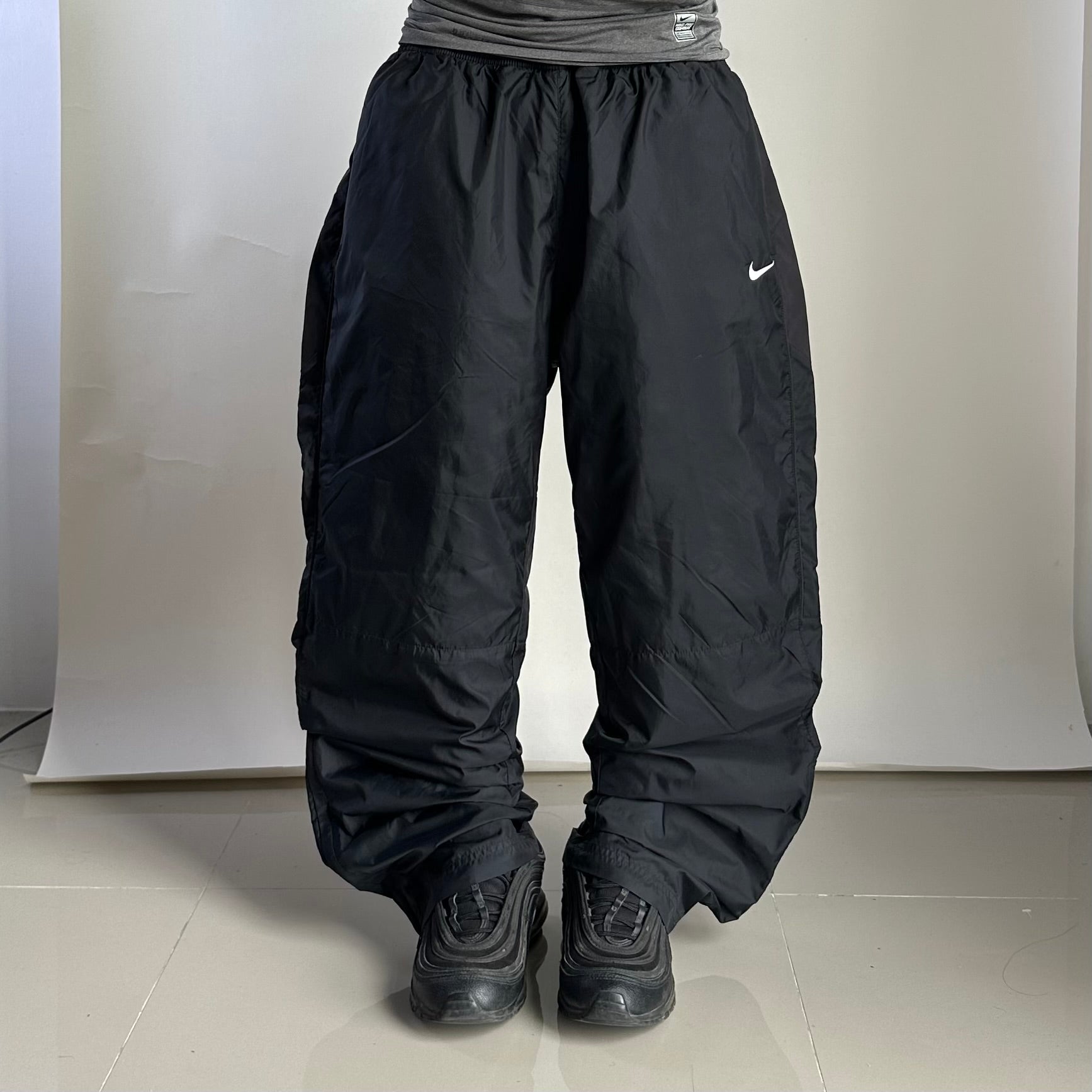 NIKE Y2K Embroidery Swoosh Track Pants in Black (Size 34-40)