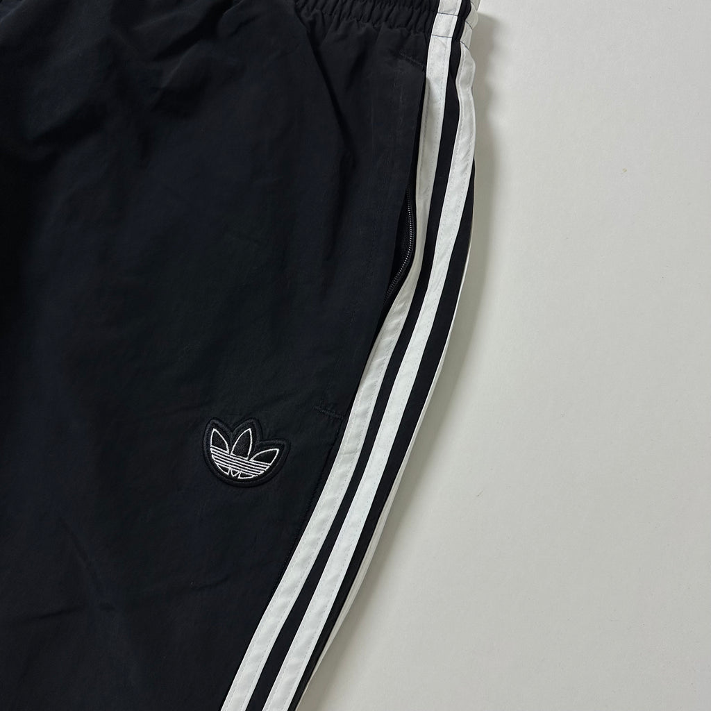 ADIDAS Originals Track Pants in Black featuring Trefoil Logo on the leg (Size 32-38)
