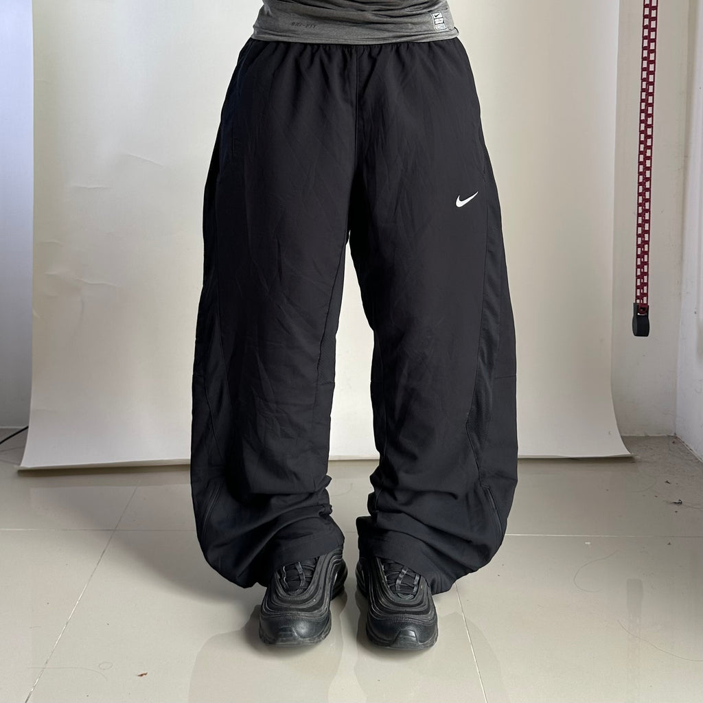NIKE Dri-Fit Track Pants in Black Size (Size 34-40)