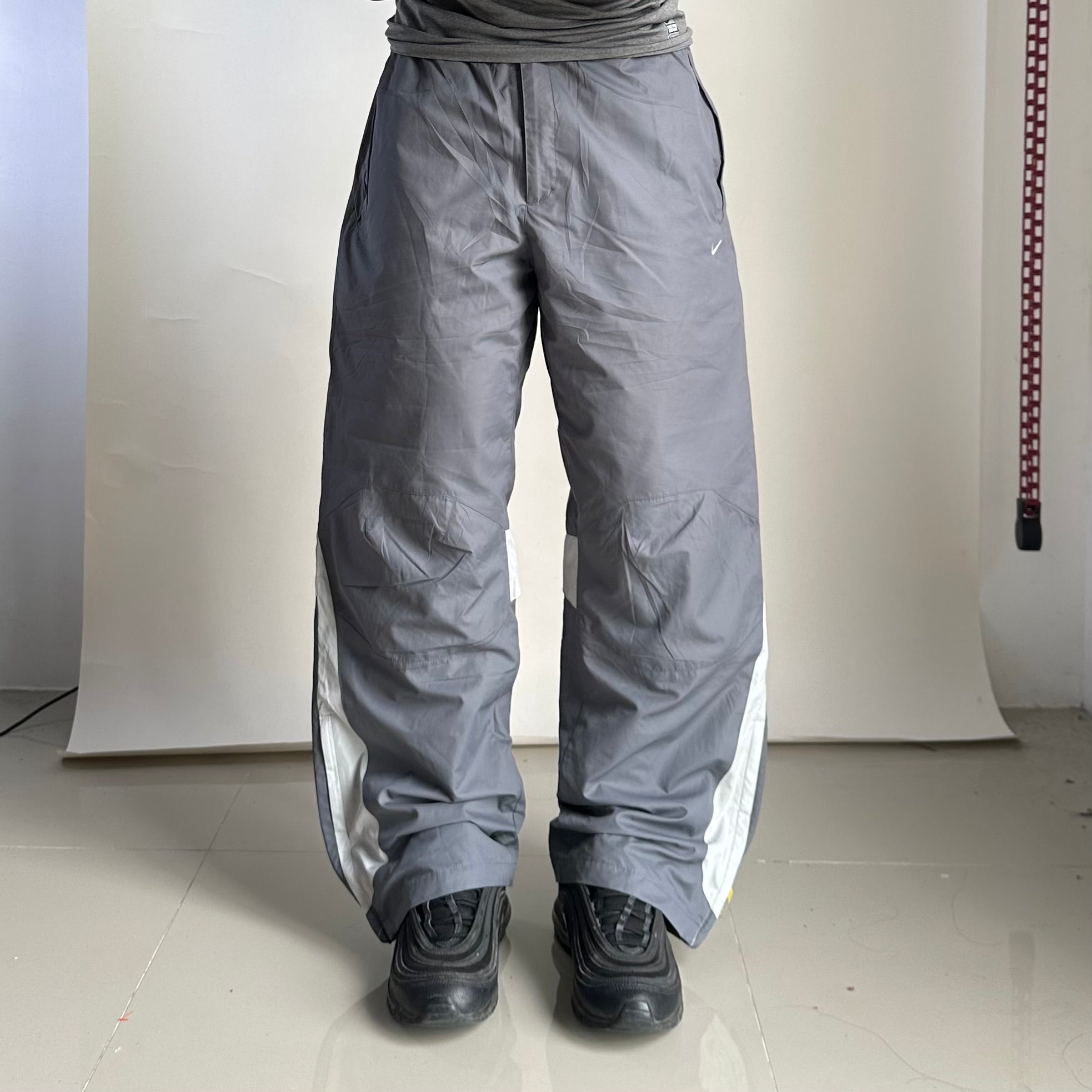 Vintage Y2K Nike Track Pants in Gray (Size 26-34)