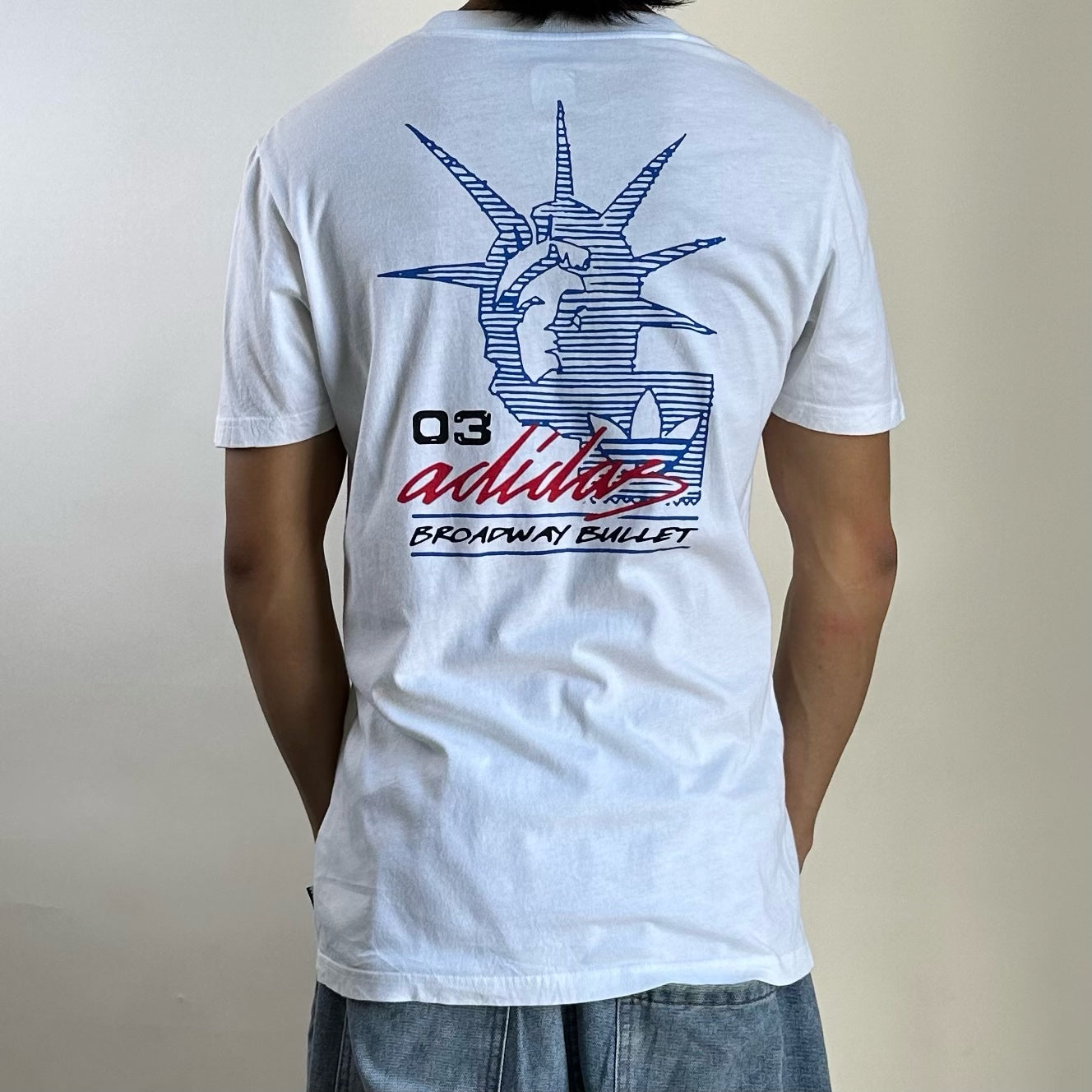 Adidas Grand T-Shirt, specifically the "White Red Blue" Small