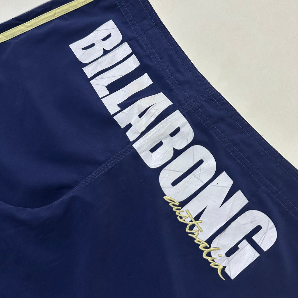 2000’s Billabong Board Shorts in Navy Blue and Yellow Color way Size 32