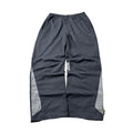 Vintage Y2K Nike Track Pants in Gray (Size 26-34)