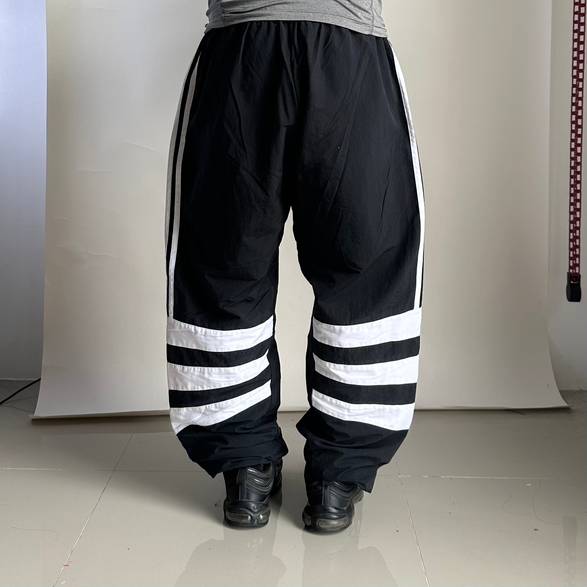 ADIDAS Originals Track Pants in Black featuring Trefoil Logo on the leg (Size 32-38)