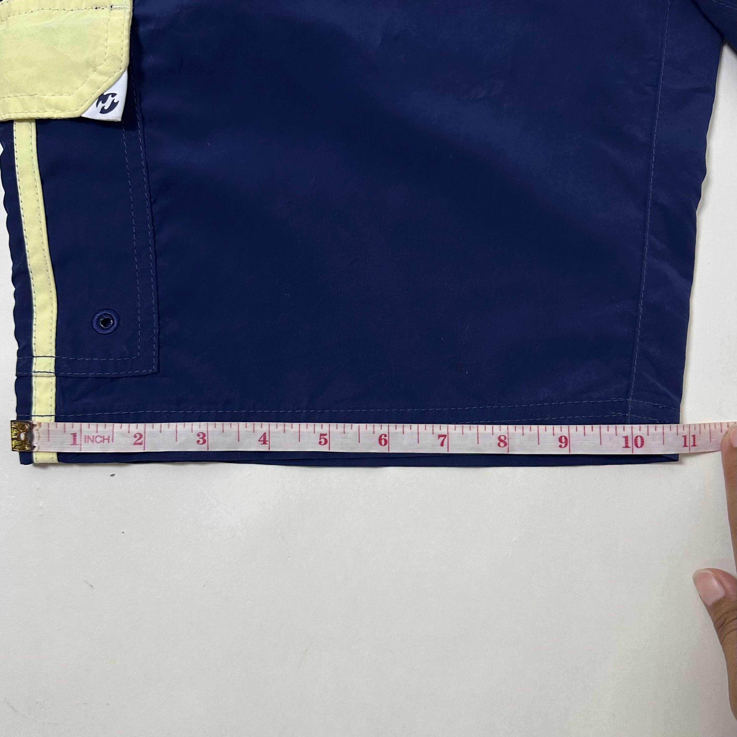2000’s Billabong Board Shorts in Navy Blue and Yellow Color way Size 32