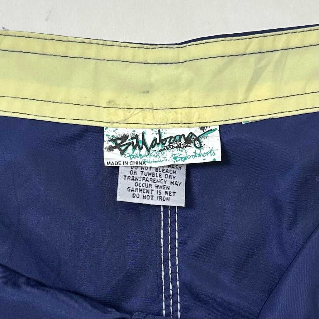 2000’s Billabong Board Shorts in Navy Blue and Yellow Color way Size 32