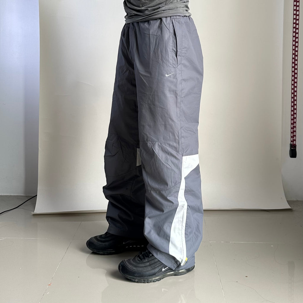 Vintage Y2K Nike Track Pants in Gray (Size 26-34)