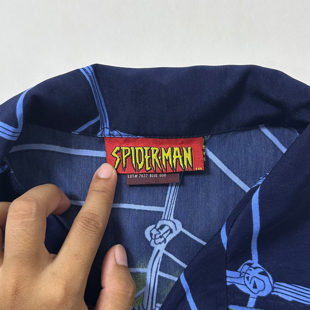2003 Vintage Marvel Spider-Man shirt features an all-over print graphic of Spider-Man in Navy Blue (Best Fit Medium)
