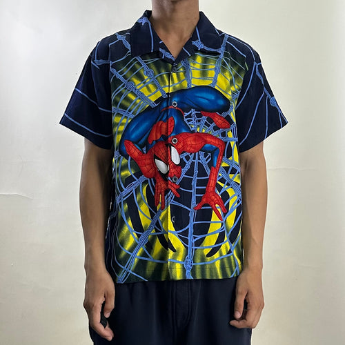2003 Vintage Marvel Spider-Man shirt features an all-over print graphic of Spider-Man in Navy Blue (Best Fit Medium)