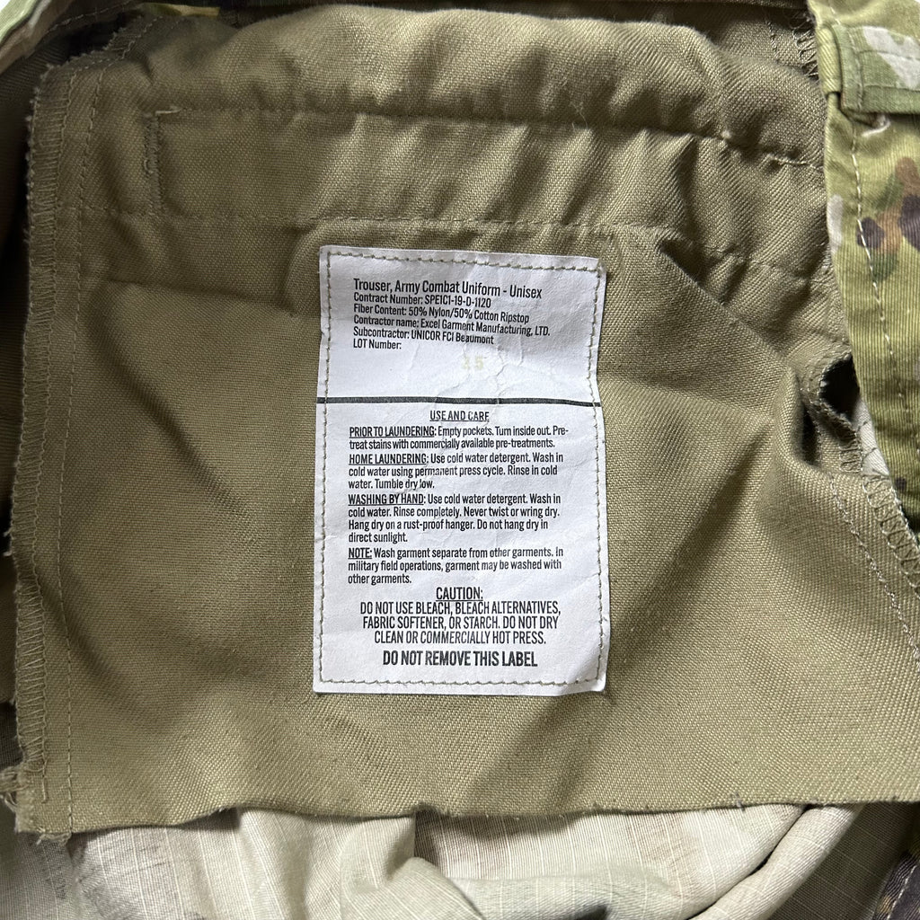 U.S. Army Combat Cargo Pants in a Multicam or Scorpion OCP camouflage pattern Size Small (27-31)