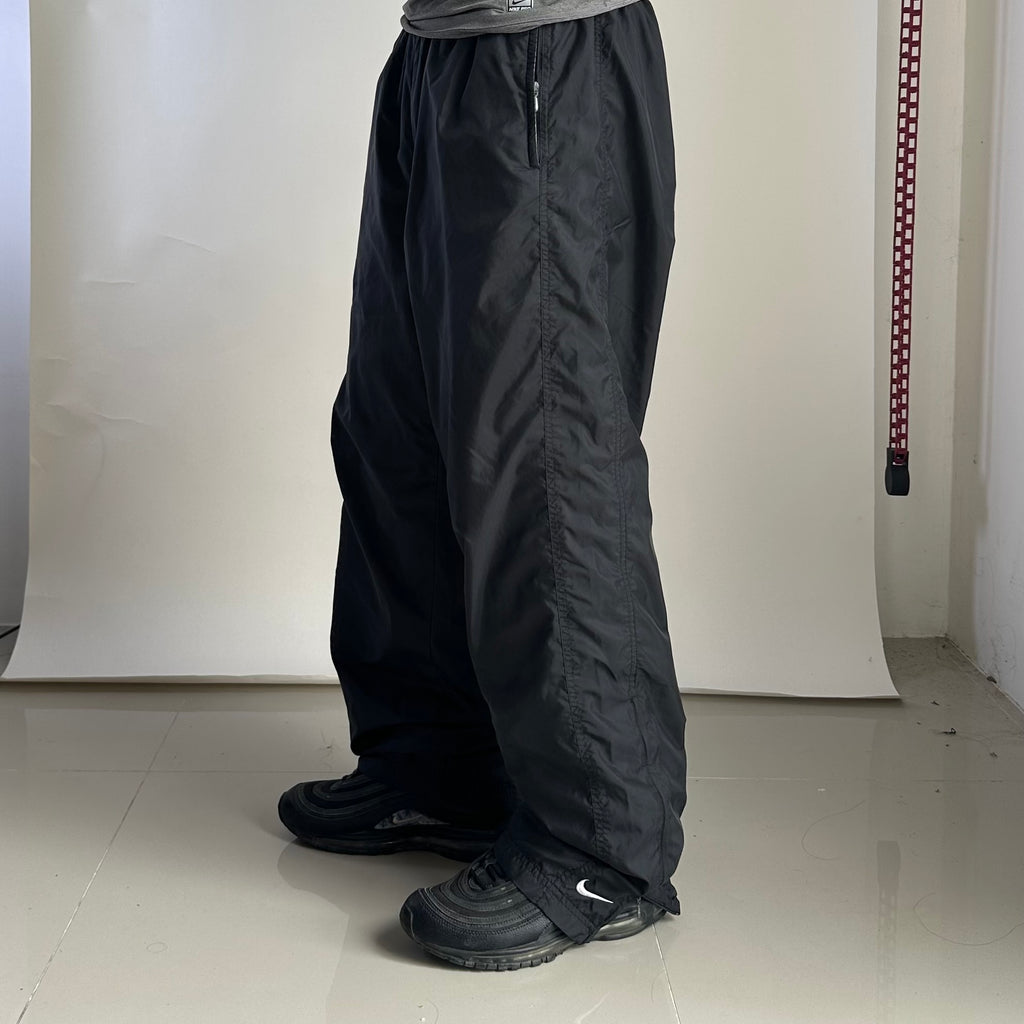 Vintage Nike Track Pants in Black (Size 28-36)