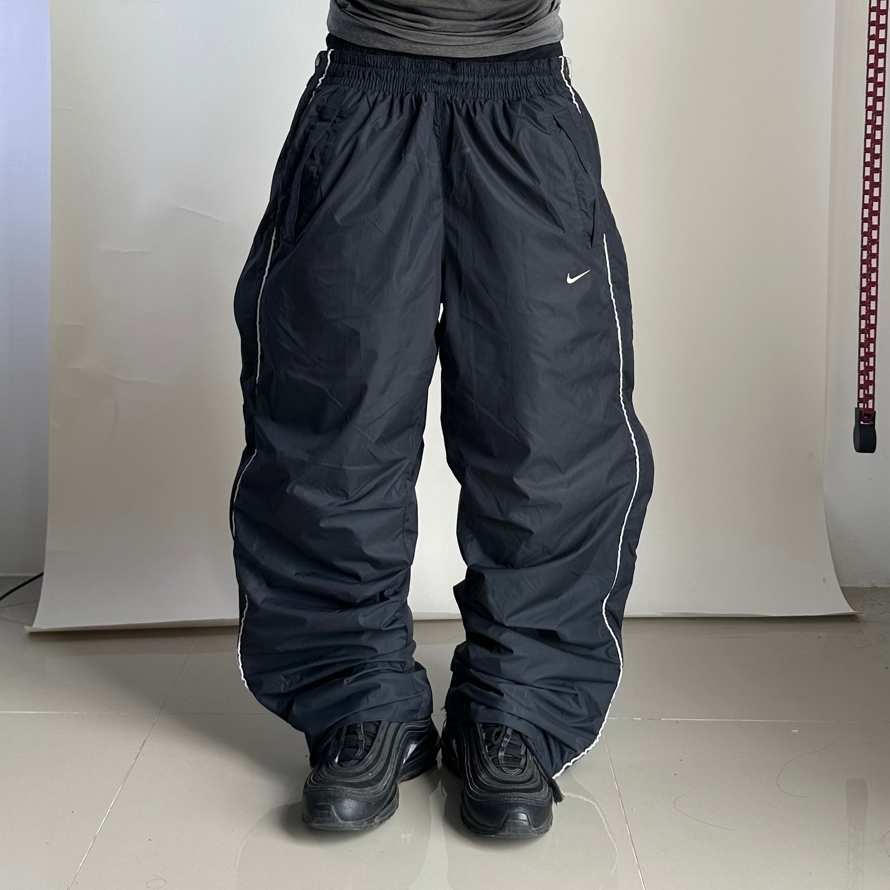 Vintage Y2K Nike Track Pants in Black (Size 32-38)